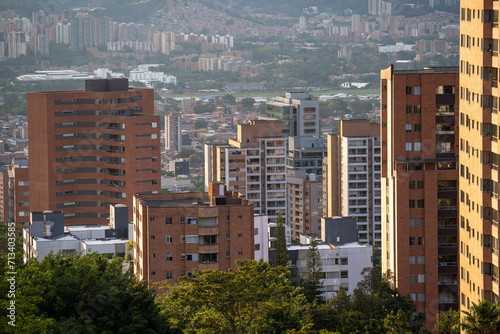 beautiful zoomed in capture of el poblado medellin in colombia during the sunset in the city
