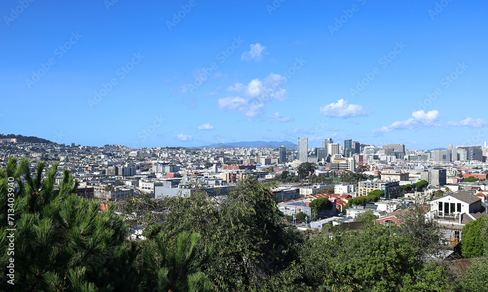 San Francisco: Looking Northwest from Potrero Hill over the city including the Mission area. The tops of the Golden Gate Bridge can be seen in the far distance.