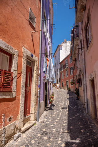 Fototapeta Naklejka Na Ścianę i Meble -  Narrow alleyways, beautiful views and architecture in Lisbon's old city.