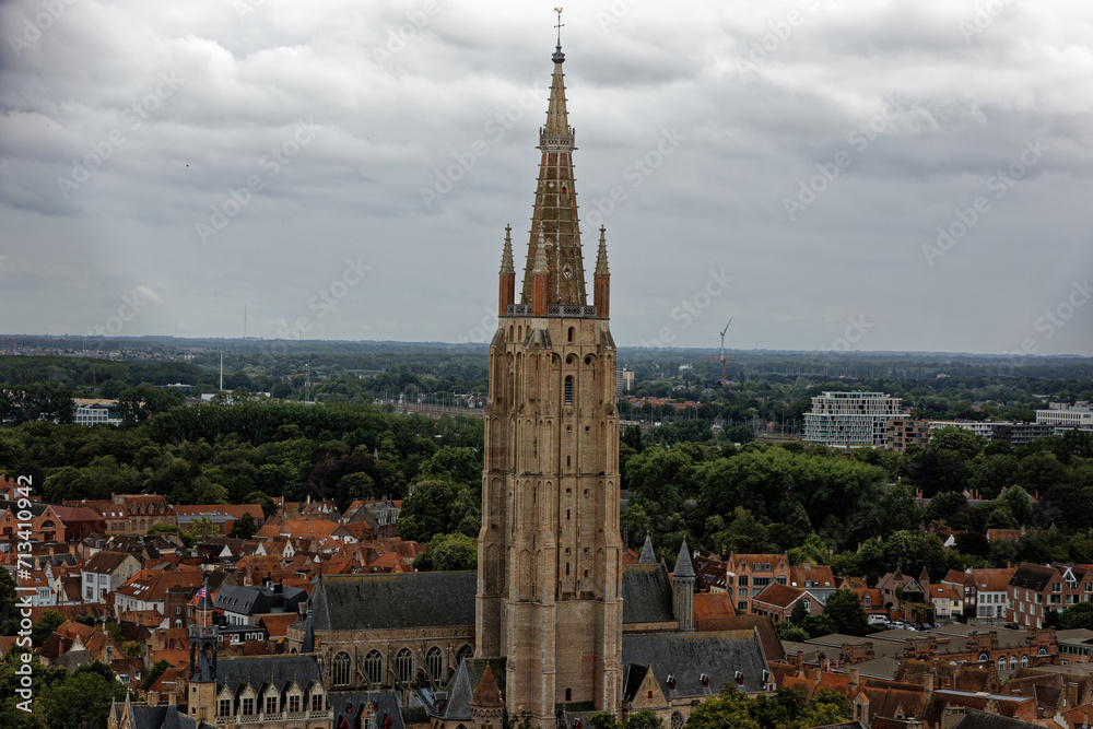 Bruges Belgium Medieval Town old city in Flanders Europe. Art and culture. Tourists from the world. Ancient medieval architecture gothic with towers buildings, canals, cobbled alleyways Brussels