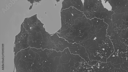 Latvia outlined. Grayscale elevation map