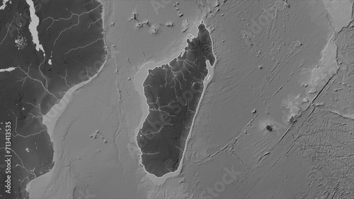 Madagascar outlined. Grayscale elevation map