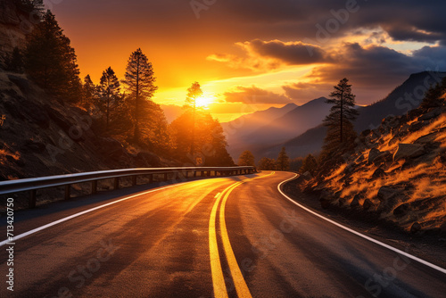 Asphalt road in the mountains at sunset. Beautiful nature landscape. © Creative