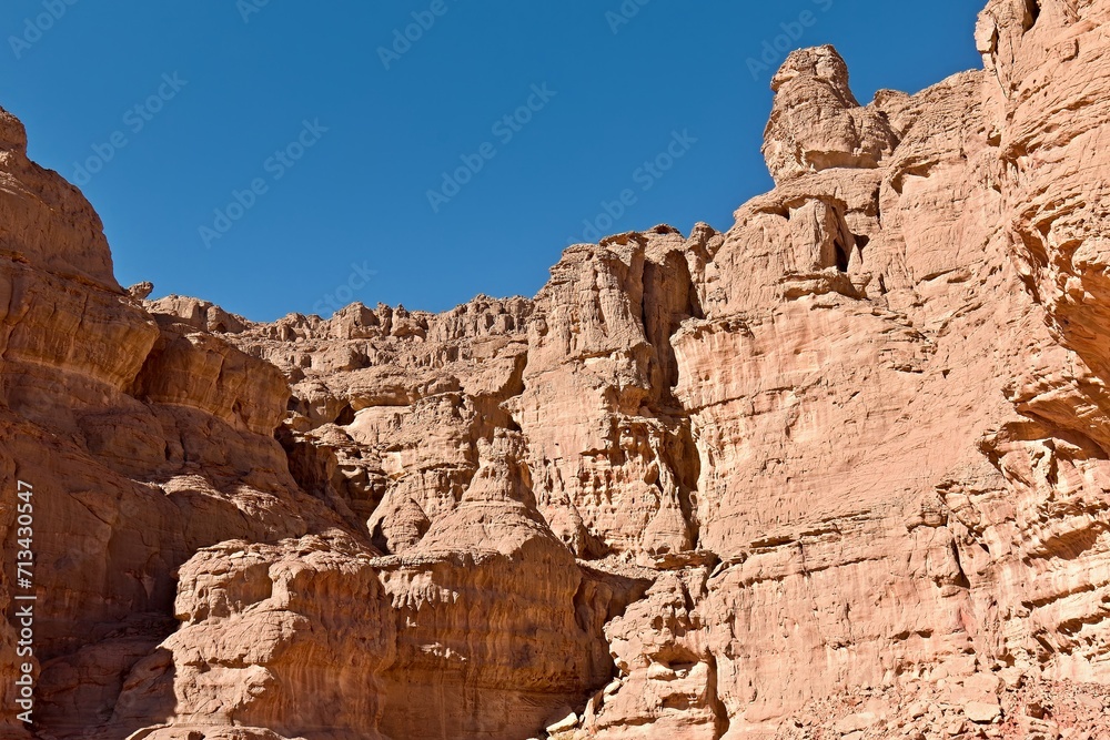 A view of the Tisseteka rock formations in the Tadrart Rouge Mountains. Tassili n Ajjer National Park, Sahara Desert, Algeria, Africa.