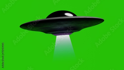 UFO Flying Saucer isolated on Green Screen background for Keying. Looped Footage of Starship. Rotating Flying spacecraft with glowing ray. Animation of Spacecraft on chromakey.
