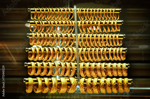 Gold bracelets in the jewelry store window.