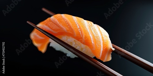 Sushi on a chopstick on a black background, rolls, asian food, background, wallpaper.