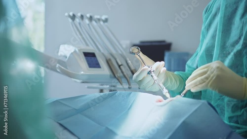 Doctor hands in medical sterile gloves giving anesthetic injection to patient in dental office. Bad toothache. Medicine, health care concept. Clinic. Indoors photo