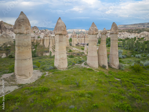 Fairy chimneys aerial view in Love Valley (Asiklar Vadisi) in Goreme Historic National Park in Cappadocia, Anatolia, Nevsehir Province, Turkey. Goreme Historic National Park is a World Heritage Site. 