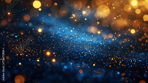 Celebrate in style: Abstract background featuring rich dark blue and shimmering gold particles. Sparkling bokeh with a touch of gold foil texture creates a magical holiday atmosphere.