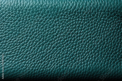  a close up of a teal leather texture with a small amount of stitching on the top of it.