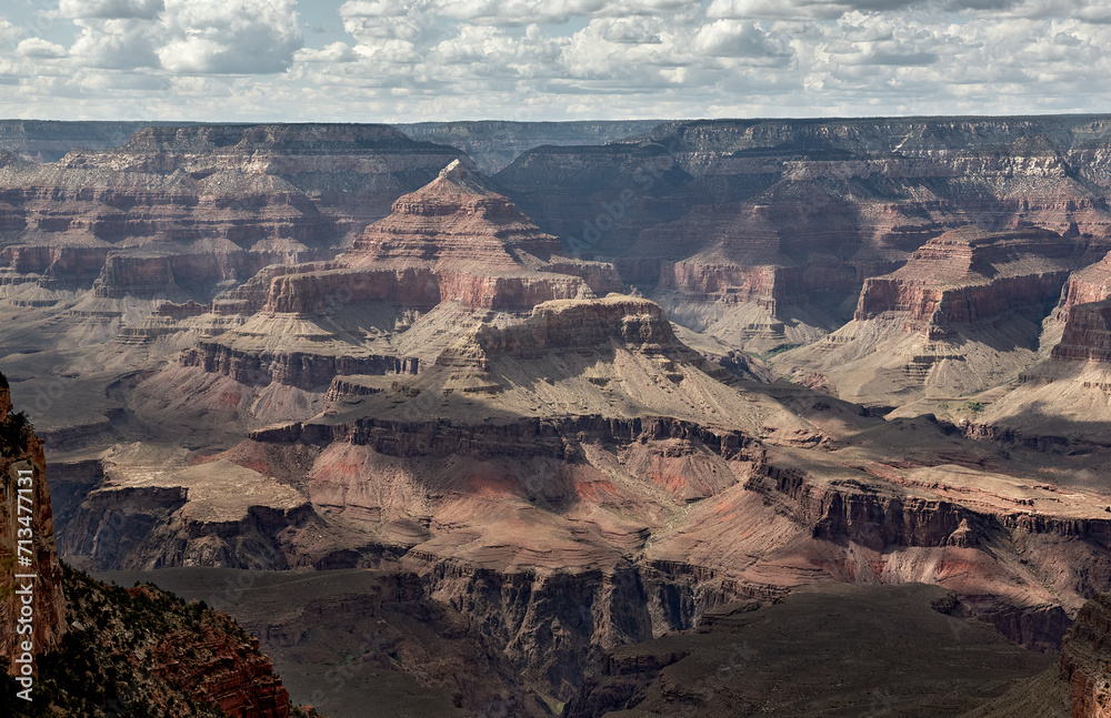 the Grand Canyon in Arizona, showcasing the iconic rock formations, vast canyon landscape, and the majestic views along the South Rim and North Rim.