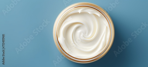 A jar of cream in the middle on a blue background, generative AI
