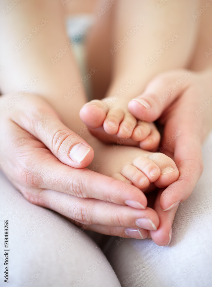 Love, person and hands with newborn or feet for development, nurture and bonding in nursery of apartment. Family, parent and baby toes with trust, support or care for relationship or closeup in home Love, person and hands with newborn or feet for development, nurture and bonding in nursery of apartment. Family, parent and baby toes with trust, support or care for relationship or closeup in home