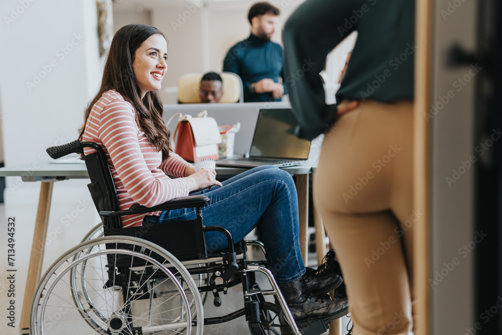 Handicapped, brunette woman in wheelchair cooperating with her coworkers on a new project at the office in a positive working atmosphere. Handicapped, brunette woman in wheelchair cooperating with her coworkers on a new project at the office in a positive working atmosphere.