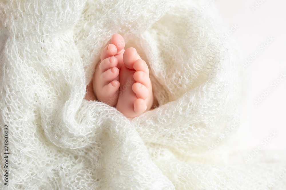 baby feet on background. feet of a newborn baby. little foot baby feet on background. feet of a newborn baby. little foot