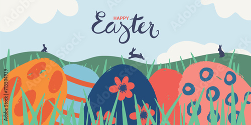 Cute illustration of Easter eggs hidden among the grass and rabbits in the meadow.