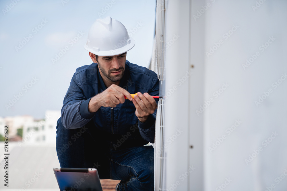 Engineers is checking the air conditioning cooling system of a major building or industrial facility. Engineers is checking the air conditioning cooling system of a major building or industrial facility.