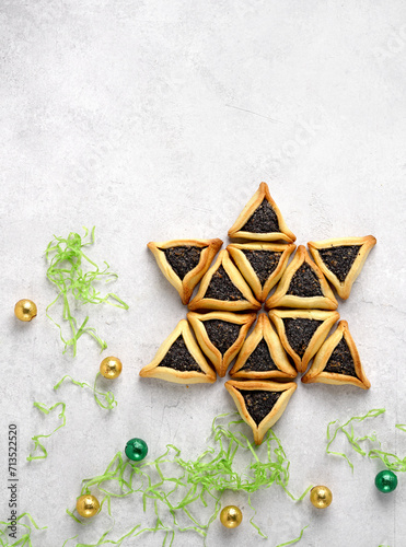 Traditional Jewish Hamantaschen cookies.Purim in the star form and candy balls photo