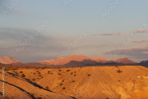 sunset over the mountains in the desert