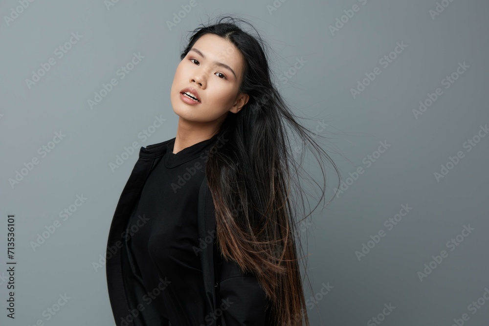Fototapeta premium Woman face portrait smile beauty skin fashion girl background grey asian healthy beautiful pretty