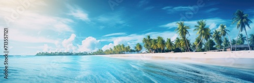 palm trees on a beach near a blue body of water