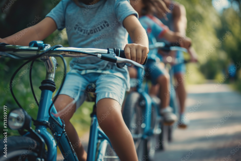 Obraz premium A group of people riding bikes on a road. Ideal for illustrating outdoor activities and group sports