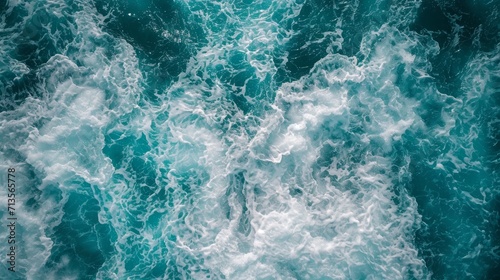 Above aerial view of turquoise ocean water with splashes © Chingiz
