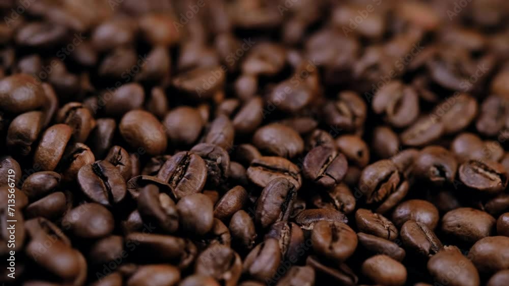 coffee beans in close-up on a black background coffee beans in close-up on a black background
