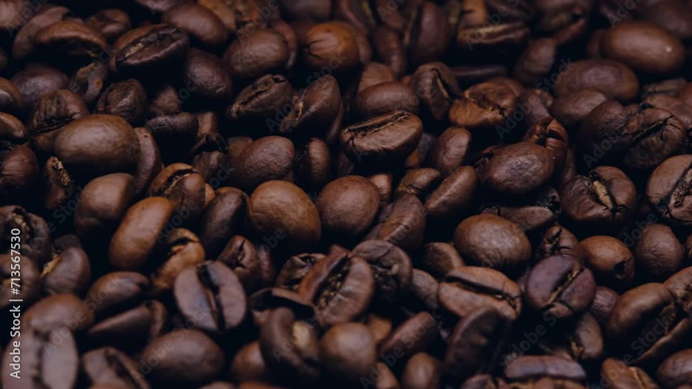 coffee beans in close-up on a black background coffee beans in close-up on a black background