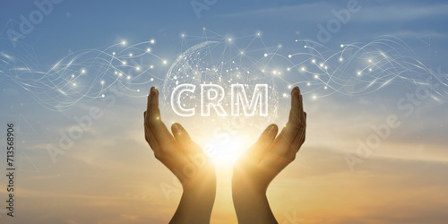 CRM. Man Holding Global Network and Connecting Data of Customer Relationship Management with Business on the Internet, Streamlining Customer Interactions, Enhancing Customer Satisfaction.