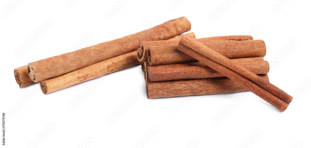 Dry aromatic cinnamon sticks isolated on white Dry aromatic cinnamon sticks isolated on white