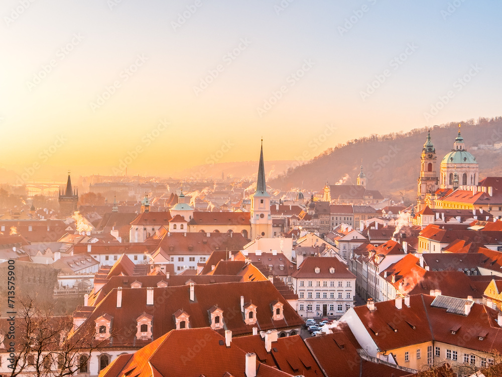 Prague's Mala Strana in winter dawn. Picturesque houses and rooftops in the morning sun. Prague, Czech Republic