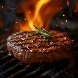 A succulent rump steak grilling to perfection, with herbs and spices, over an open flame