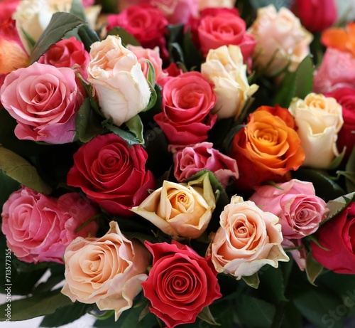 Bouquet of beautiful roses on light grey background  closeup