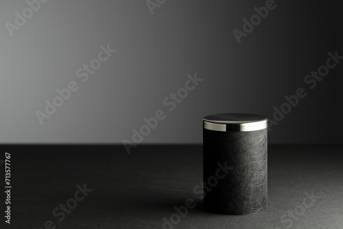 Black podium on a black background.