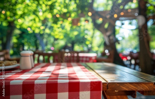 a red and white checked cloth hangs on a wooden table in an outdoors restaurant Generative AI photo