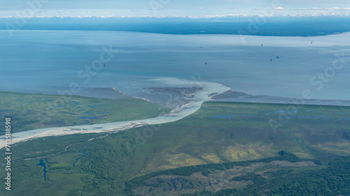 Oil Platforms in Cook Inlet basin  Middle Ground Shoal  Alaska. McArthur River with glacial sediment flows into Cook Inlet opposite of Nikiski on the Kenai Peninsula. 
