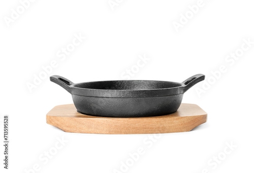 Frying pan and wooden board isolated on white. Cooking utensils photo
