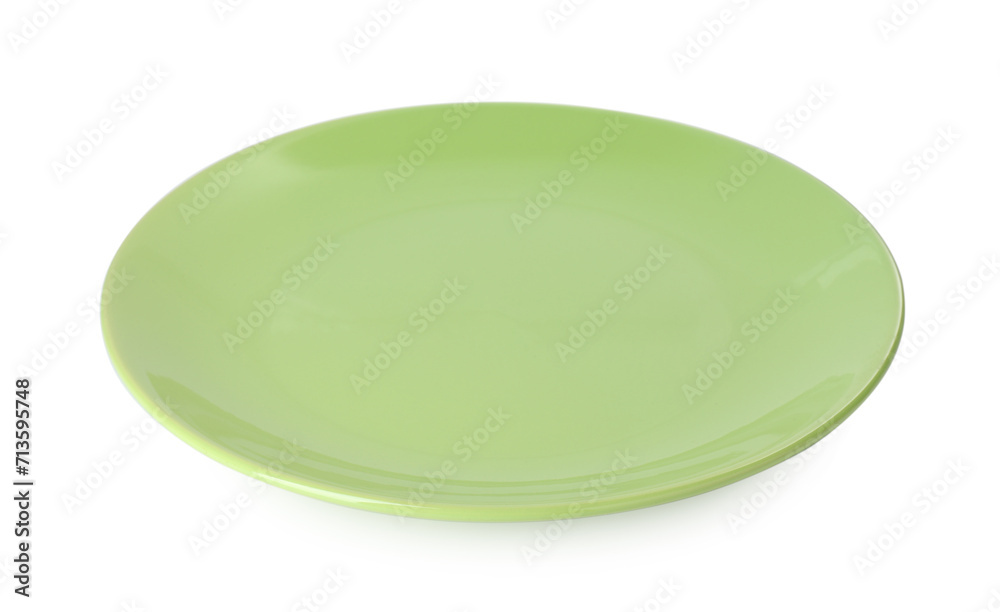 One beautiful green plate isolated on white One beautiful green plate isolated on white