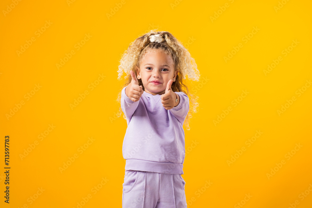 Child Girl Expressing Positivity with a Thumbs-Up Gesture ? Encouraging Success and Uplifting Vibes Child Girl Expressing Positivity with a Thumbs-Up Gesture ? Encouraging Success and Uplifting Vibes