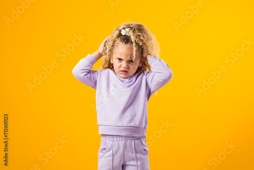 Child girl angry and mad screaming frustrated and furious. Negative emotions concept