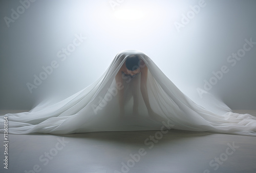 Close up of Bride with a veil practicing yoga. Stress relief before the wedding. Photographed from an ant's perspective. creative fashion and wedding concept.