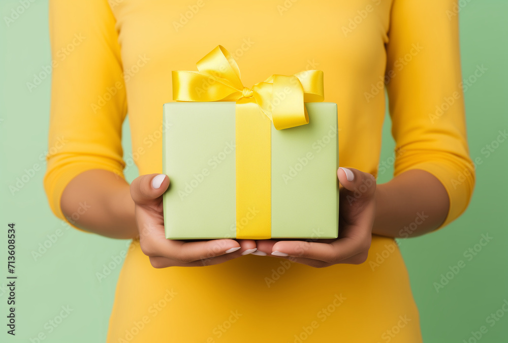 woman holding gift box.Minimal party concept.Copy space,top view,Generative AI woman holding gift box.Minimal party concept.Copy space,top view,Generative AI