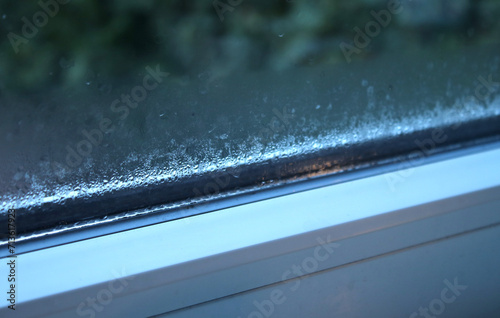 Close up of condensation on the window in a house, water drops and hight humidity