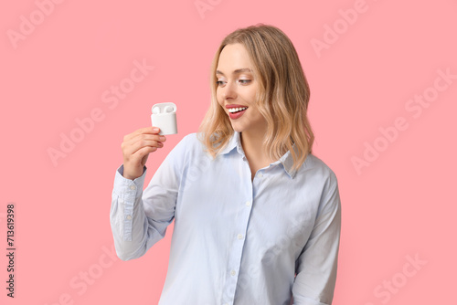 Pretty young woman with wir...