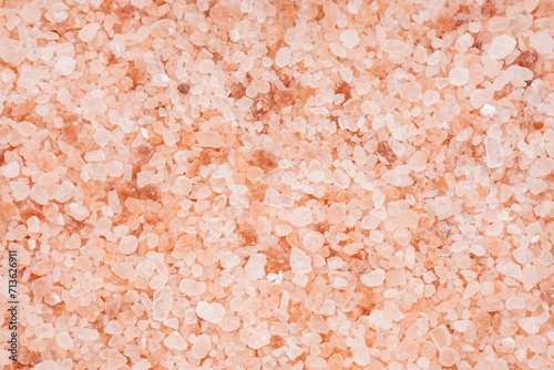 Texture of Himalayan pink salt as background, closeup