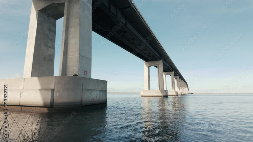 Antioch bridge in California delta with windmills 