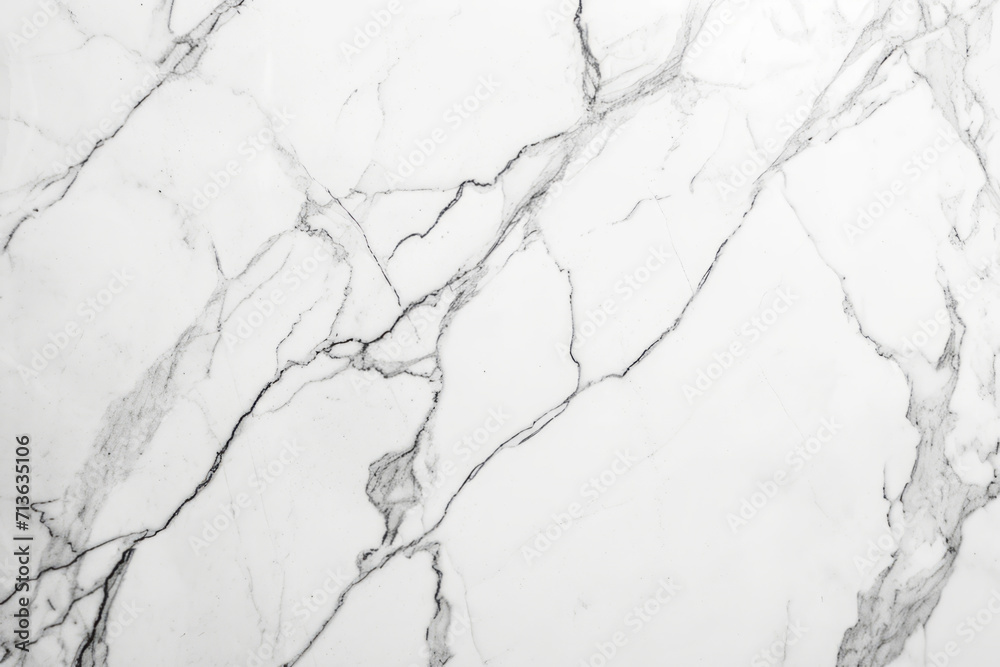 White marble background with distinctive dark grey veins creating a luxurious and natural pattern.