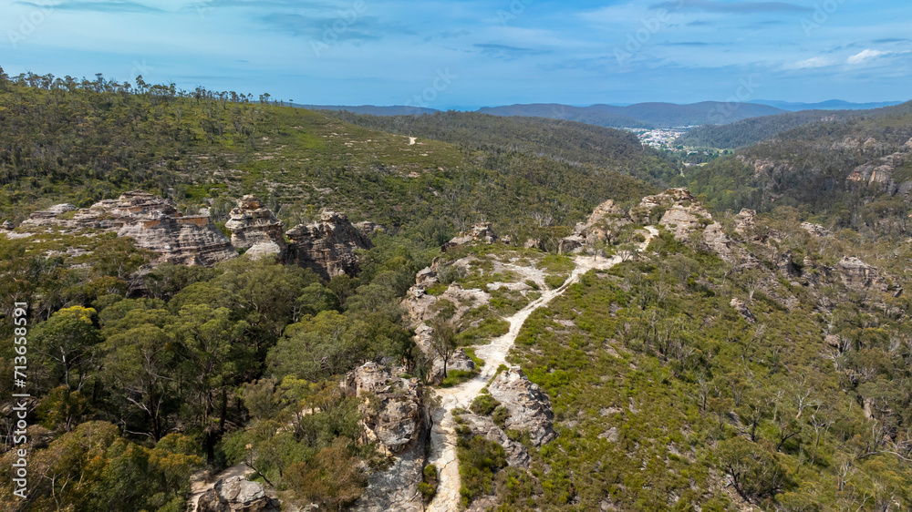 Drone aerial photograph of the impressive sandstone rock formations in the Gardens of Stone State Conservation area near Lithgow in New South Wales in Australia Drone aerial photograph of the impressive sandstone rock formations in the Gardens of Stone State Conservation area near Lithgow in New South Wales in Australia